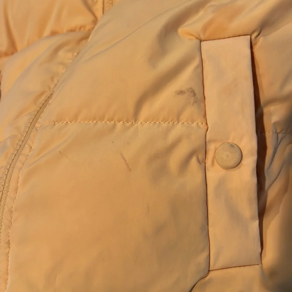 Yellow puffer jacket